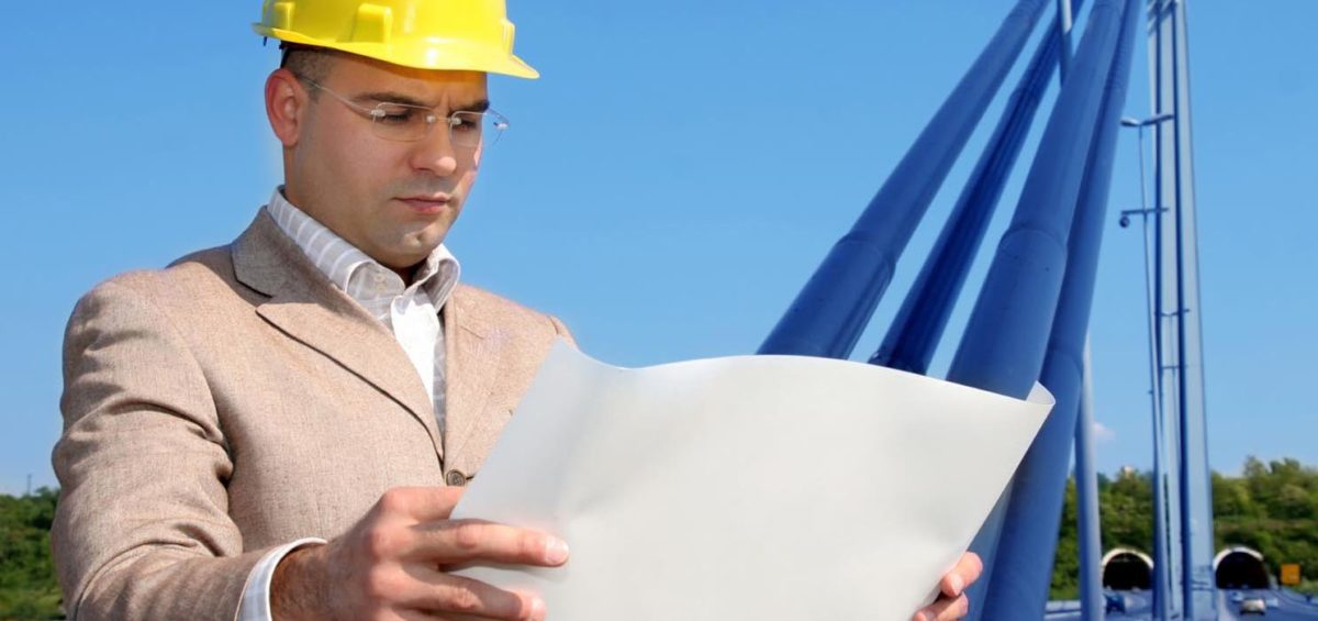 Man looking at construction estimates