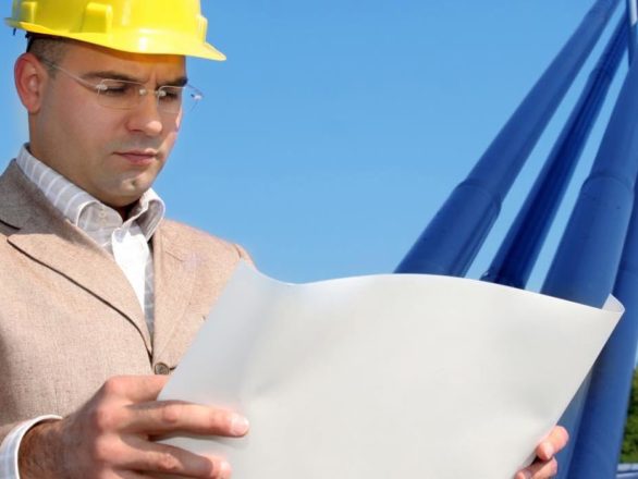 Man looking at construction estimates